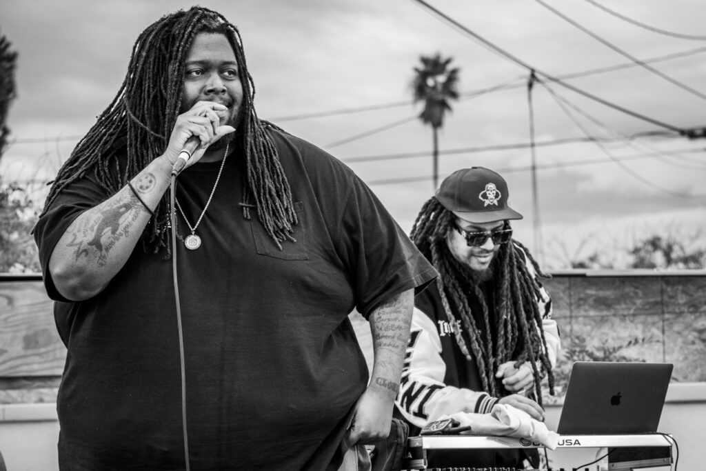 Two men performing on stage.